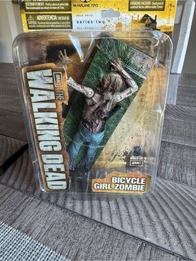 The Walking Dead Bicycle Girl Zombie Action Figure - Green/Gray